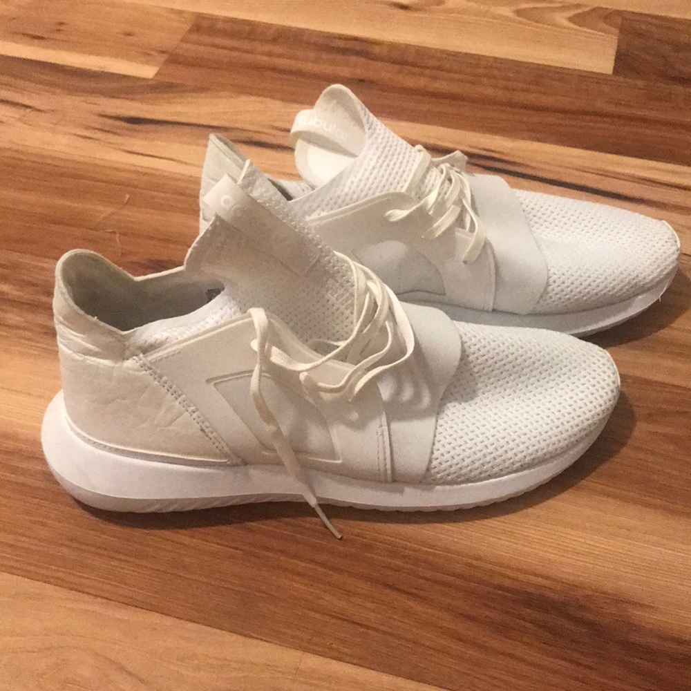 Brand new Tubular white Adidas. Never worn.